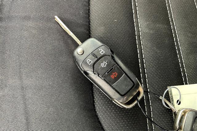 used 2014 Ford Fusion car, priced at $7,000