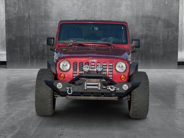 used 2013 Jeep Wrangler Unlimited car, priced at $17,124