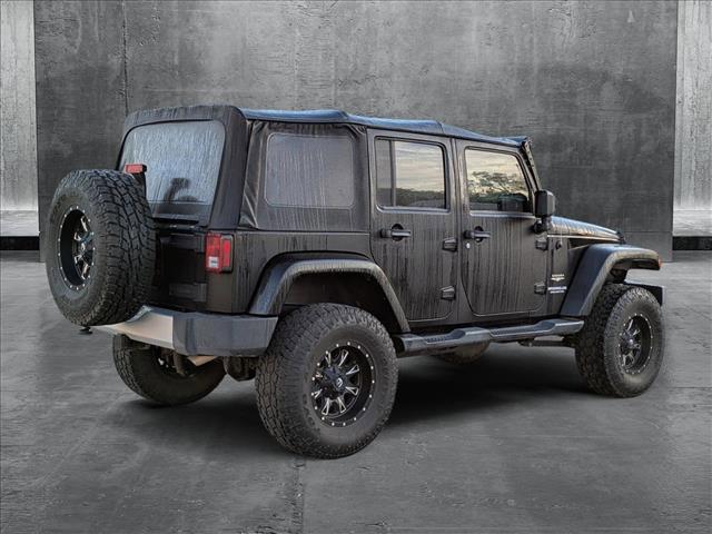 used 2013 Jeep Wrangler Unlimited car, priced at $18,987