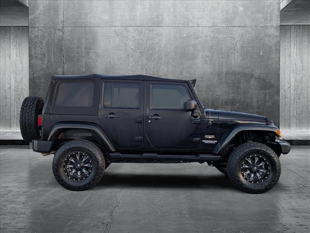 used 2013 Jeep Wrangler Unlimited car, priced at $17,658