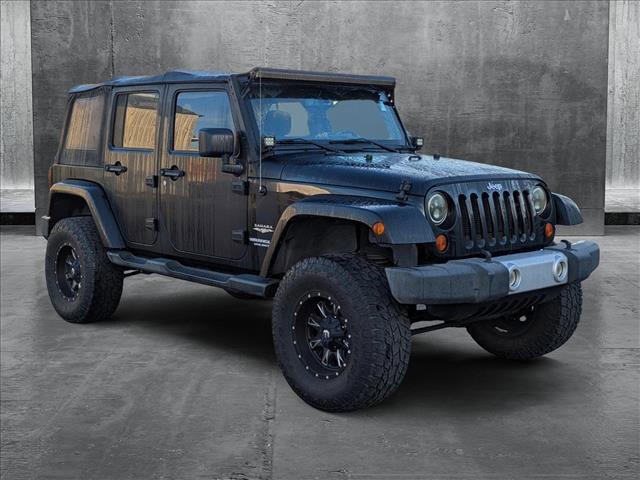 used 2013 Jeep Wrangler Unlimited car, priced at $18,987