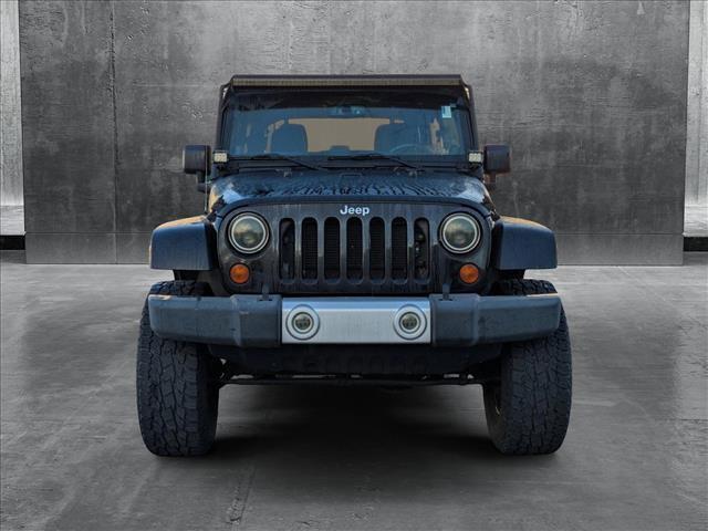 used 2013 Jeep Wrangler Unlimited car, priced at $18,987