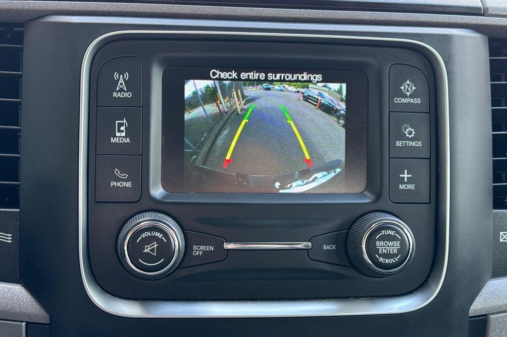 used 2018 Ram 1500 car, priced at $23,487