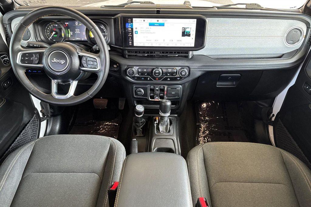 used 2024 Jeep Wrangler 4xe car, priced at $32,100
