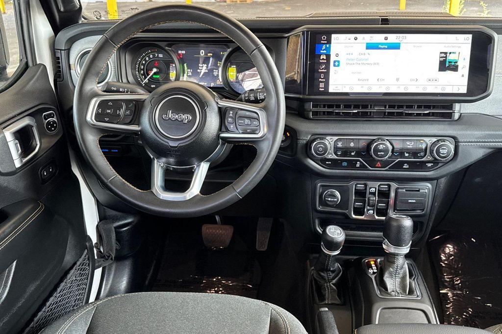 used 2024 Jeep Wrangler 4xe car, priced at $32,100