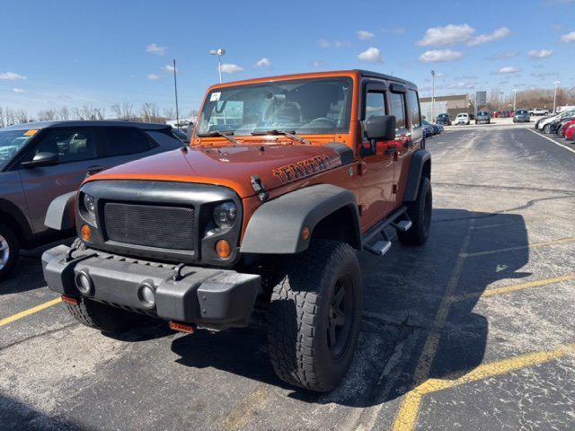 used 2011 Jeep Wrangler Unlimited car, priced at $14,494