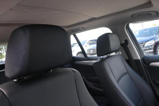 used 2013 BMW X1 car, priced at $10,995