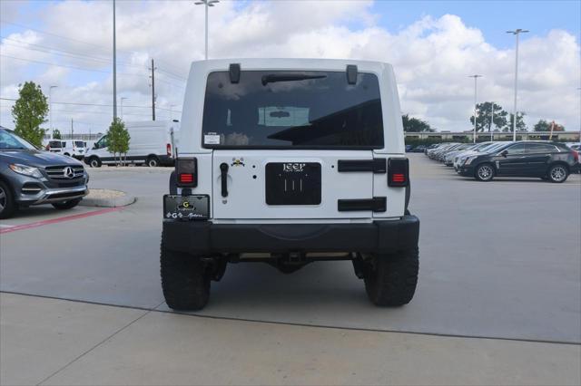 used 2012 Jeep Wrangler Unlimited car, priced at $15,995