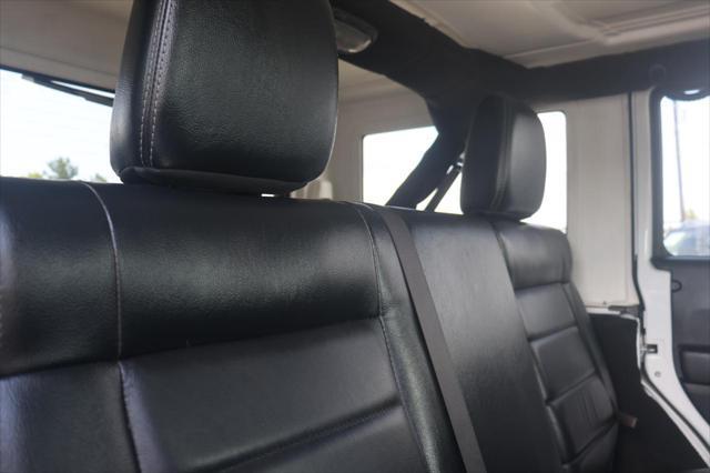 used 2012 Jeep Wrangler Unlimited car, priced at $15,995