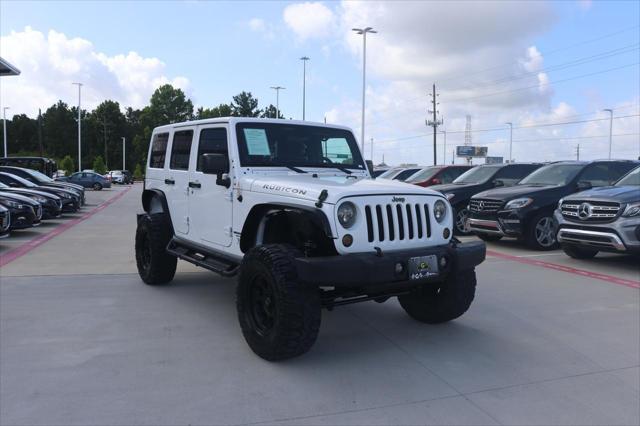 used 2012 Jeep Wrangler Unlimited car, priced at $15,995