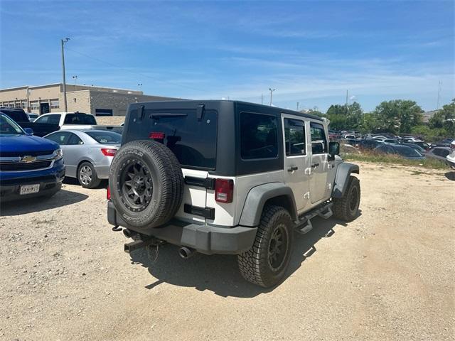 used 2017 Jeep Wrangler Unlimited car, priced at $22,385