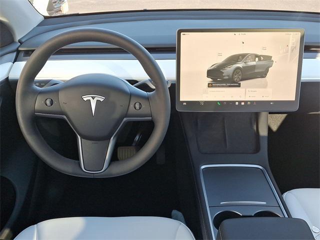 used 2024 Tesla Model Y car, priced at $32,999