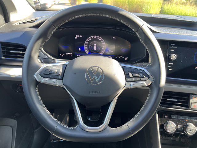 used 2024 Volkswagen Taos car, priced at $25,452