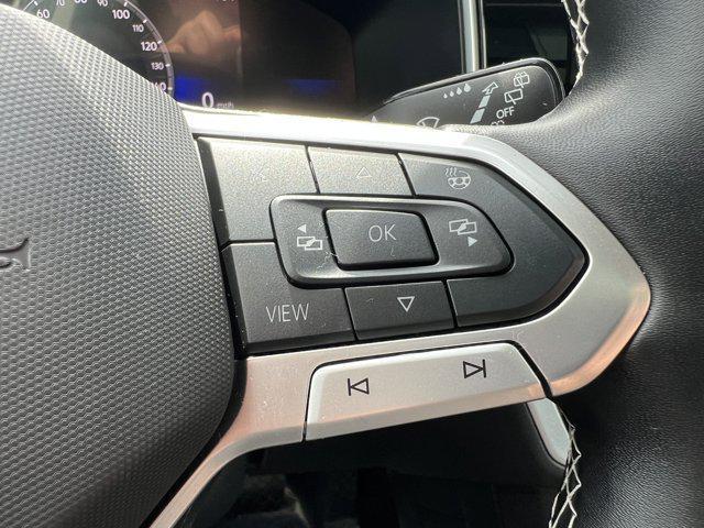 used 2025 Volkswagen Taos car, priced at $27,511