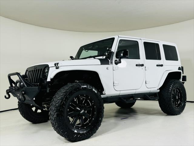 used 2014 Jeep Wrangler Unlimited car, priced at $22,999