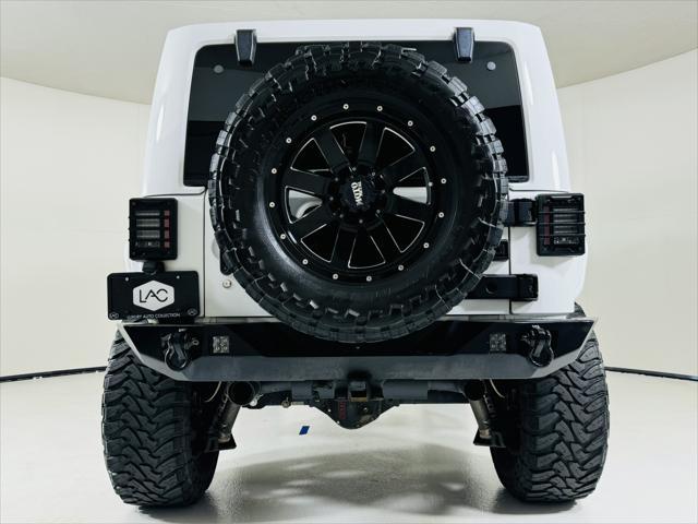 used 2014 Jeep Wrangler Unlimited car, priced at $22,999