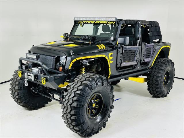 used 2012 Jeep Wrangler Unlimited car, priced at $89,999