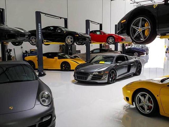 used 2023 Ferrari SF90 Spider car, priced at $599,995