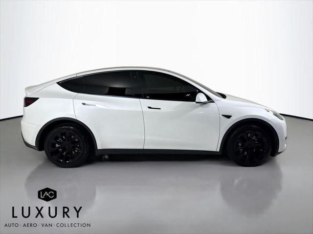 used 2022 Tesla Model Y car, priced at $27,999