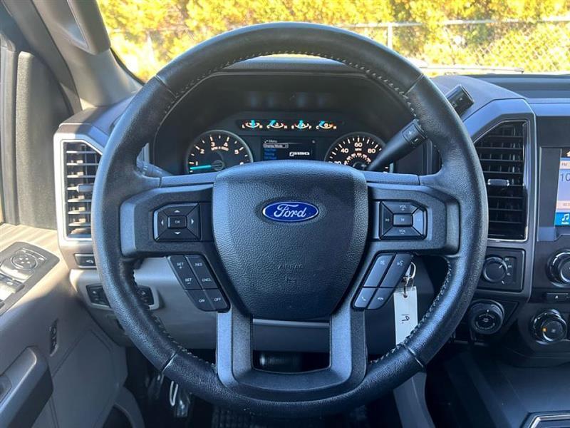 used 2018 Ford F-150 car, priced at $26,433