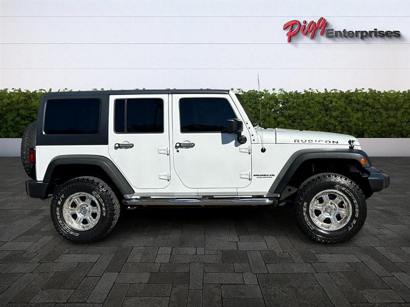 used 2015 Jeep Wrangler Unlimited car, priced at $22,866