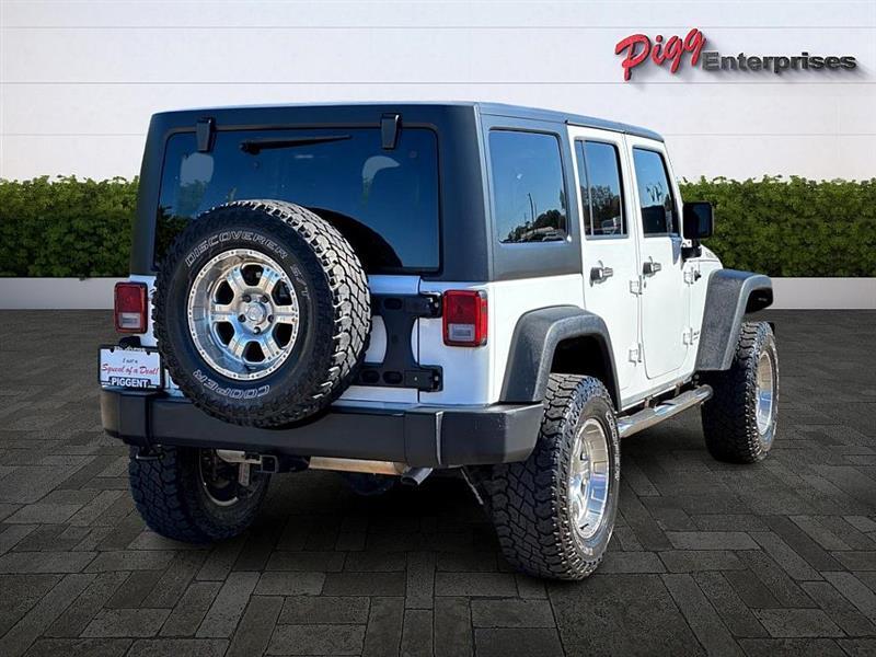 used 2015 Jeep Wrangler Unlimited car, priced at $22,866