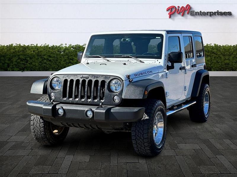 used 2015 Jeep Wrangler Unlimited car, priced at $22,866