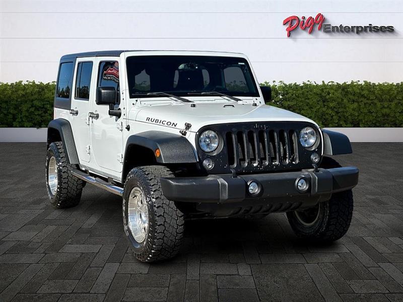 used 2015 Jeep Wrangler Unlimited car, priced at $22,866