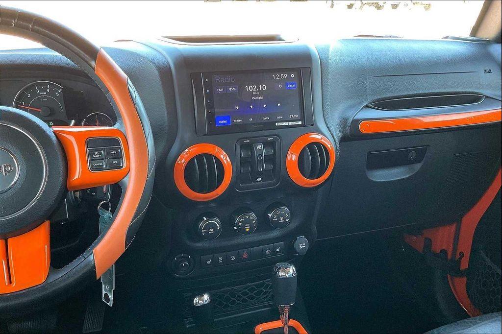 used 2015 Jeep Wrangler Unlimited car, priced at $19,199