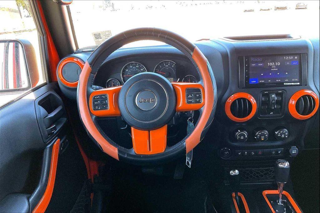 used 2015 Jeep Wrangler Unlimited car, priced at $19,199