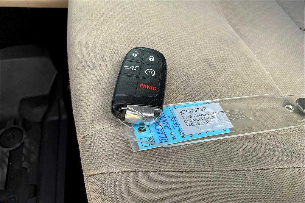 used 2018 Jeep Grand Cherokee car, priced at $13,151