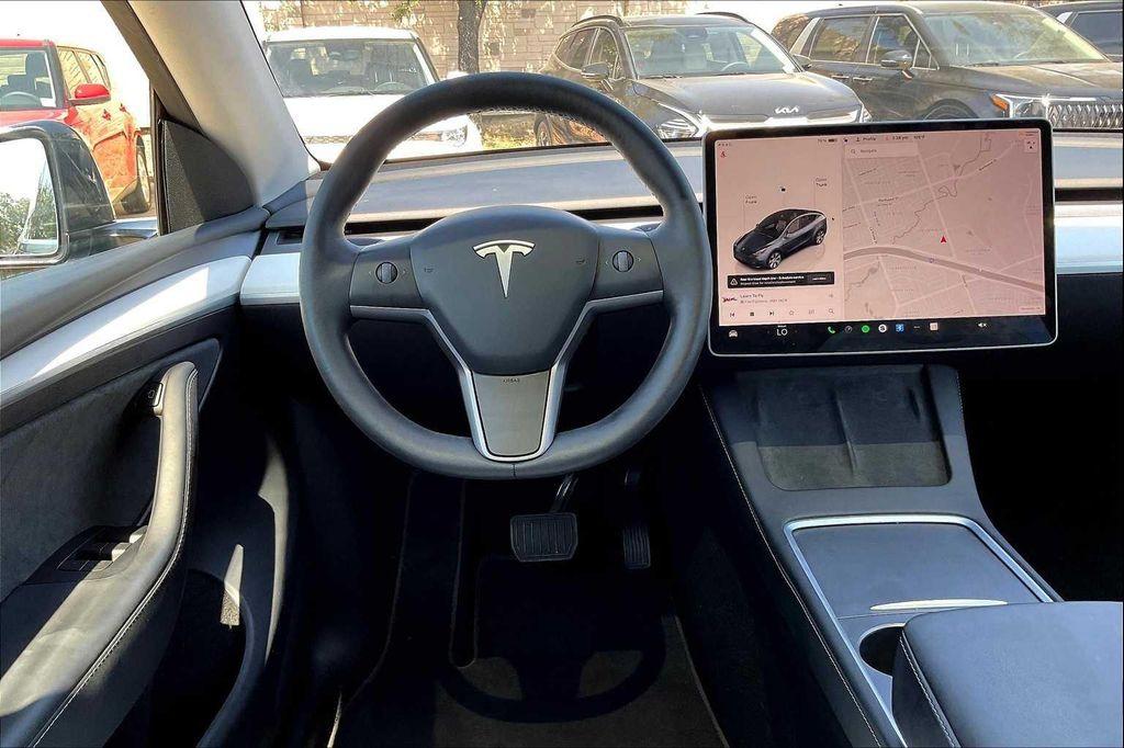 used 2024 Tesla Model Y car, priced at $30,347