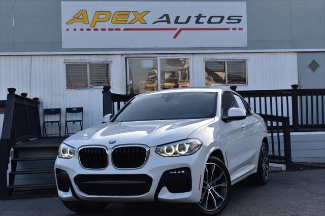 used 2021 BMW X4 car, priced at $25,500