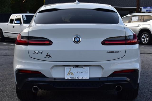 used 2021 BMW X4 car, priced at $25,500