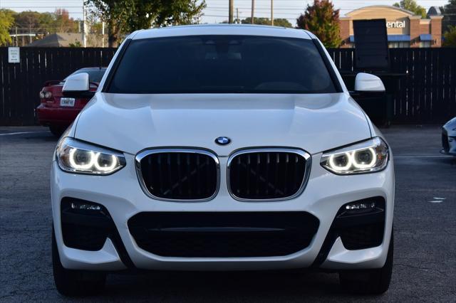 used 2021 BMW X4 car, priced at $25,500