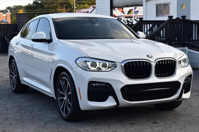 used 2021 BMW X4 car, priced at $25,500