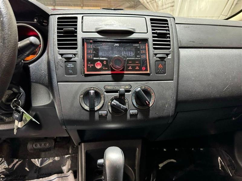 used 2009 Nissan Versa car, priced at $3,995