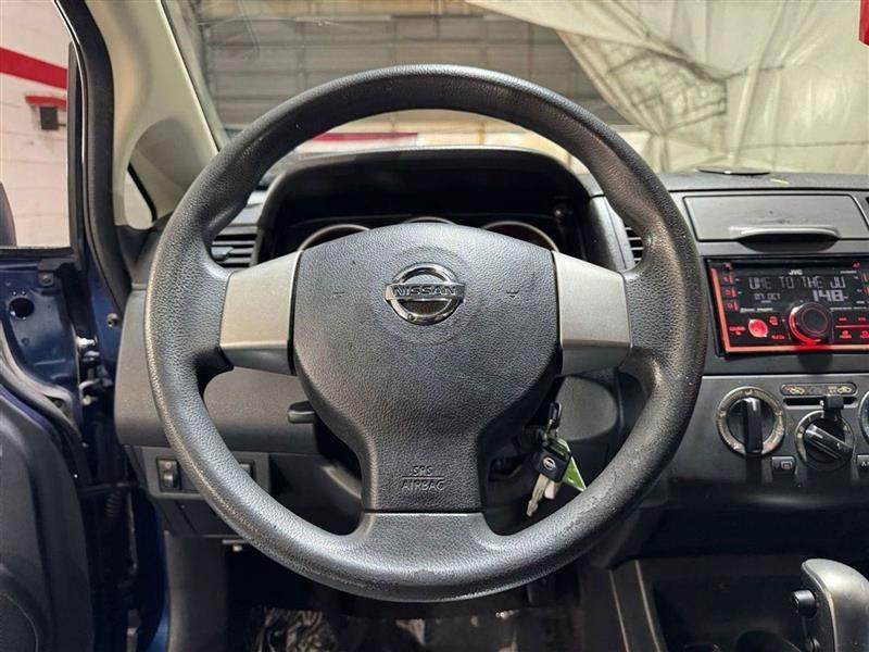 used 2009 Nissan Versa car, priced at $3,995