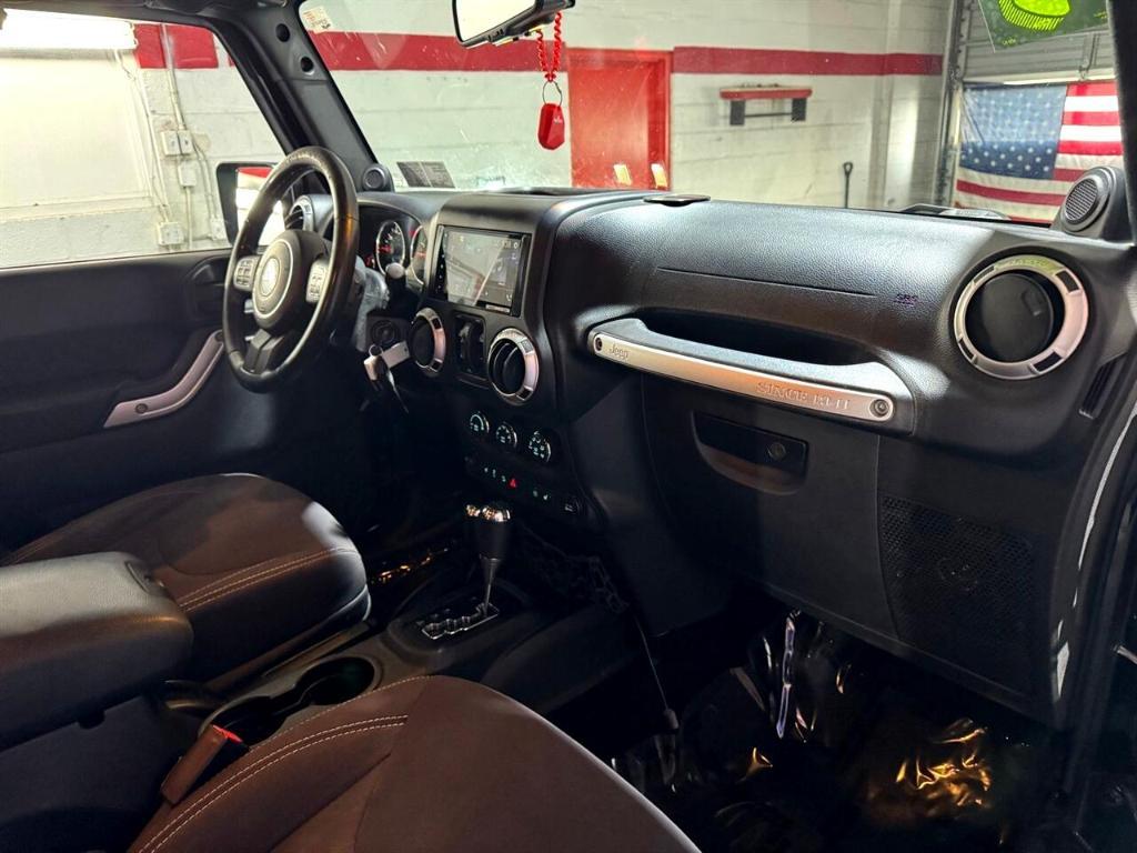 used 2014 Jeep Wrangler Unlimited car, priced at $18,411