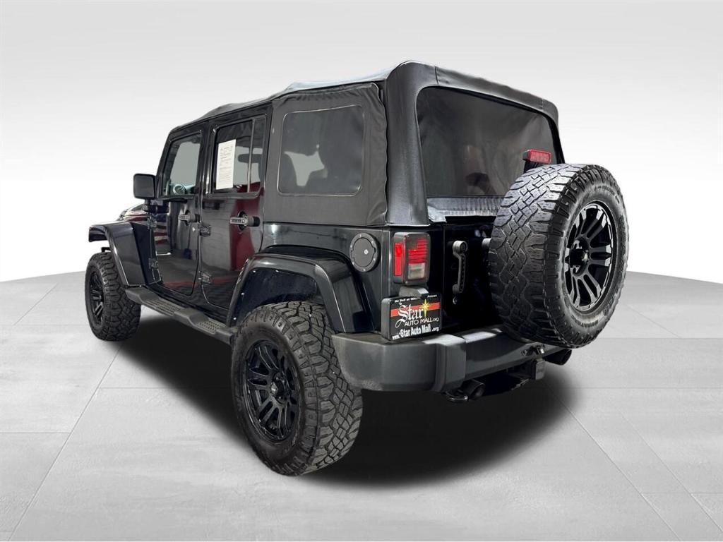 used 2014 Jeep Wrangler Unlimited car, priced at $18,411