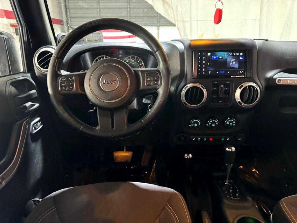 used 2014 Jeep Wrangler Unlimited car, priced at $18,411