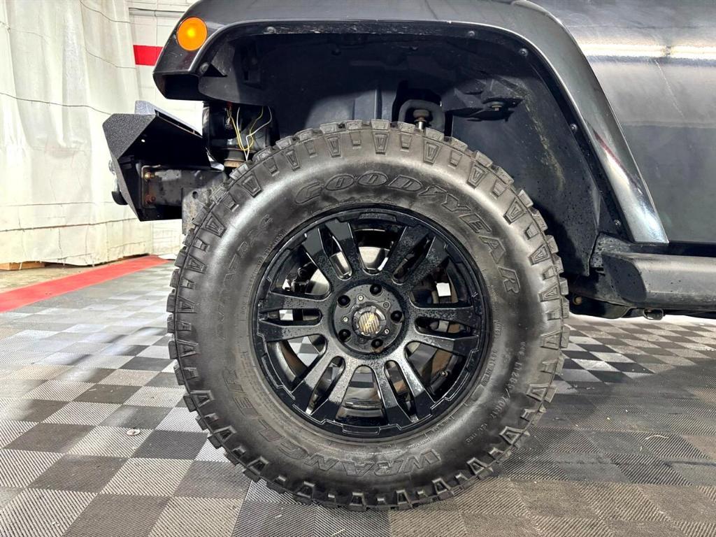 used 2014 Jeep Wrangler Unlimited car, priced at $18,411