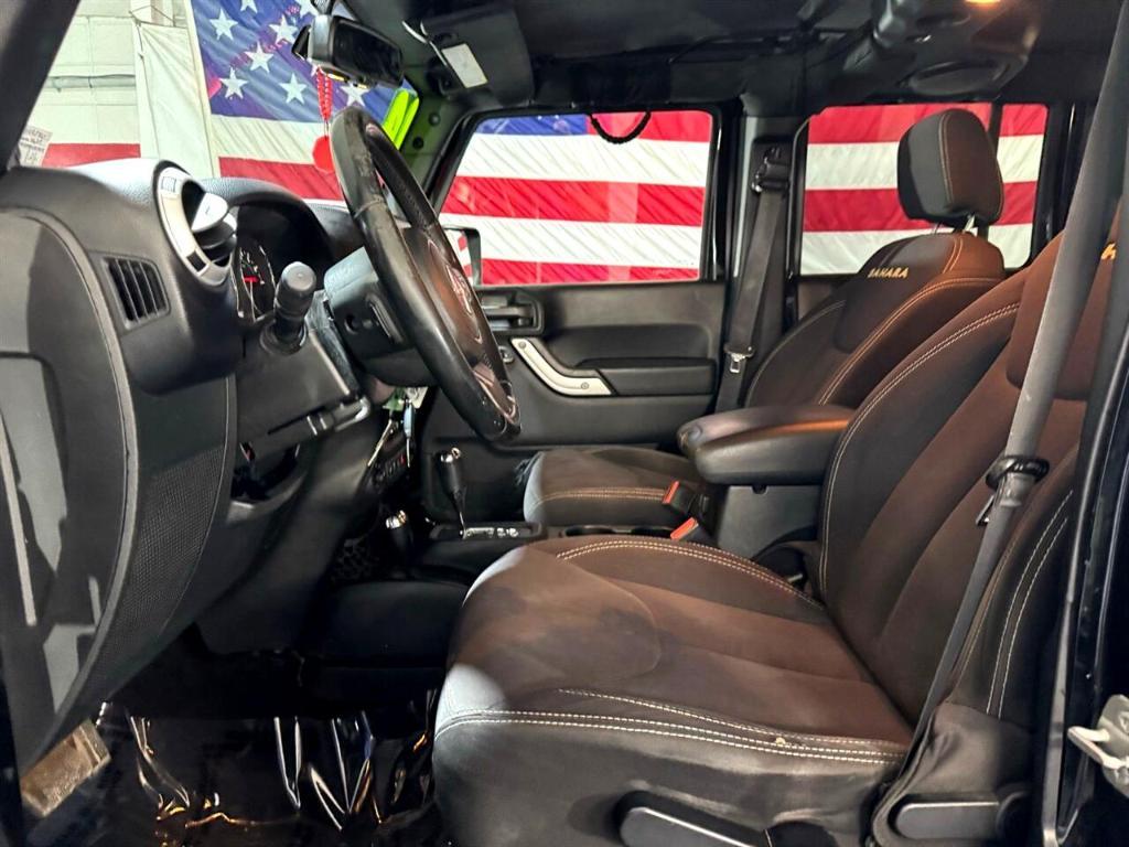 used 2014 Jeep Wrangler Unlimited car, priced at $18,411