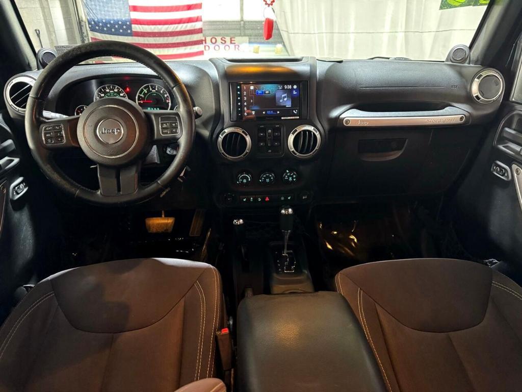 used 2014 Jeep Wrangler Unlimited car, priced at $18,411