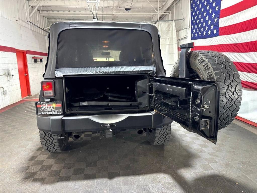 used 2014 Jeep Wrangler Unlimited car, priced at $18,411