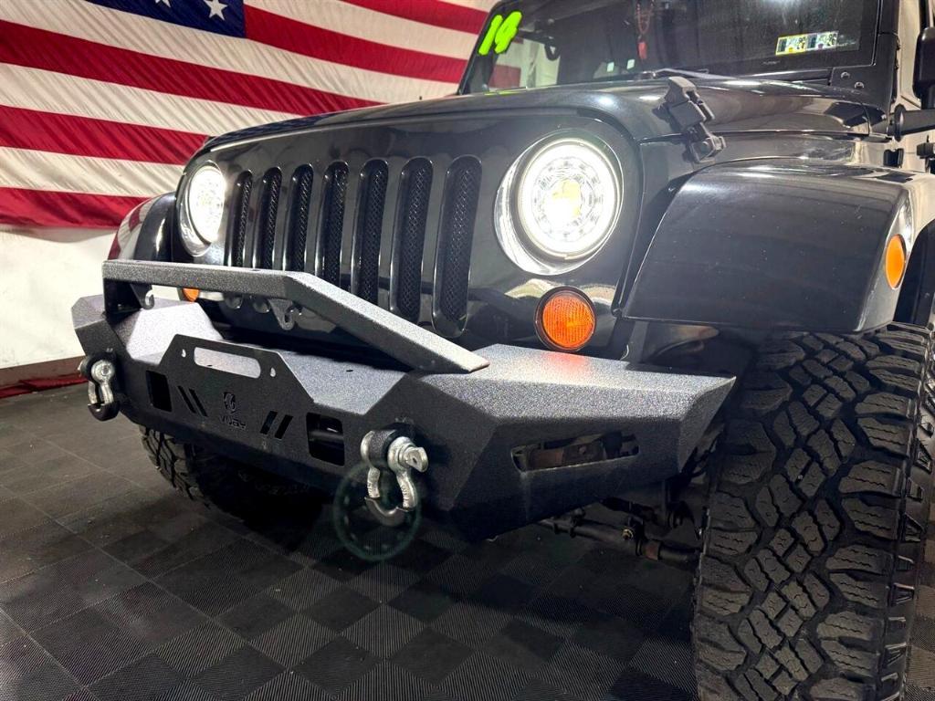 used 2014 Jeep Wrangler Unlimited car, priced at $18,411