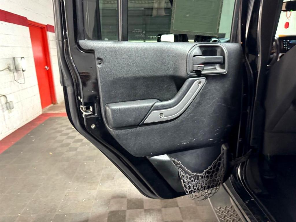 used 2014 Jeep Wrangler Unlimited car, priced at $18,411