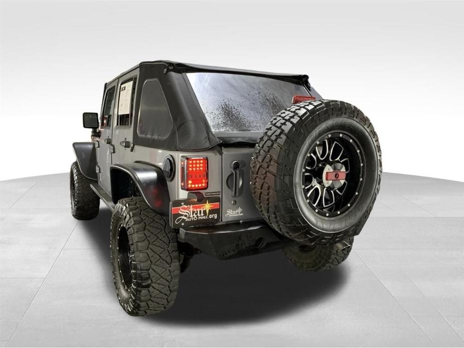 used 2013 Jeep Wrangler Unlimited car, priced at $19,955