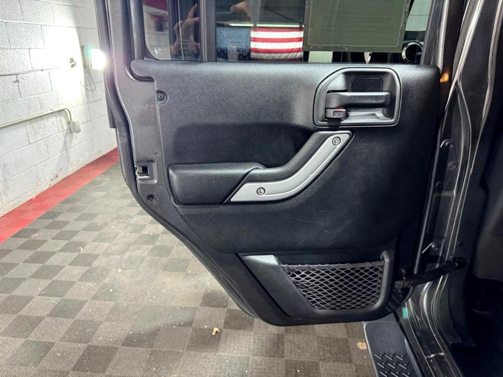 used 2018 Jeep Wrangler JK Unlimited car, priced at $23,977