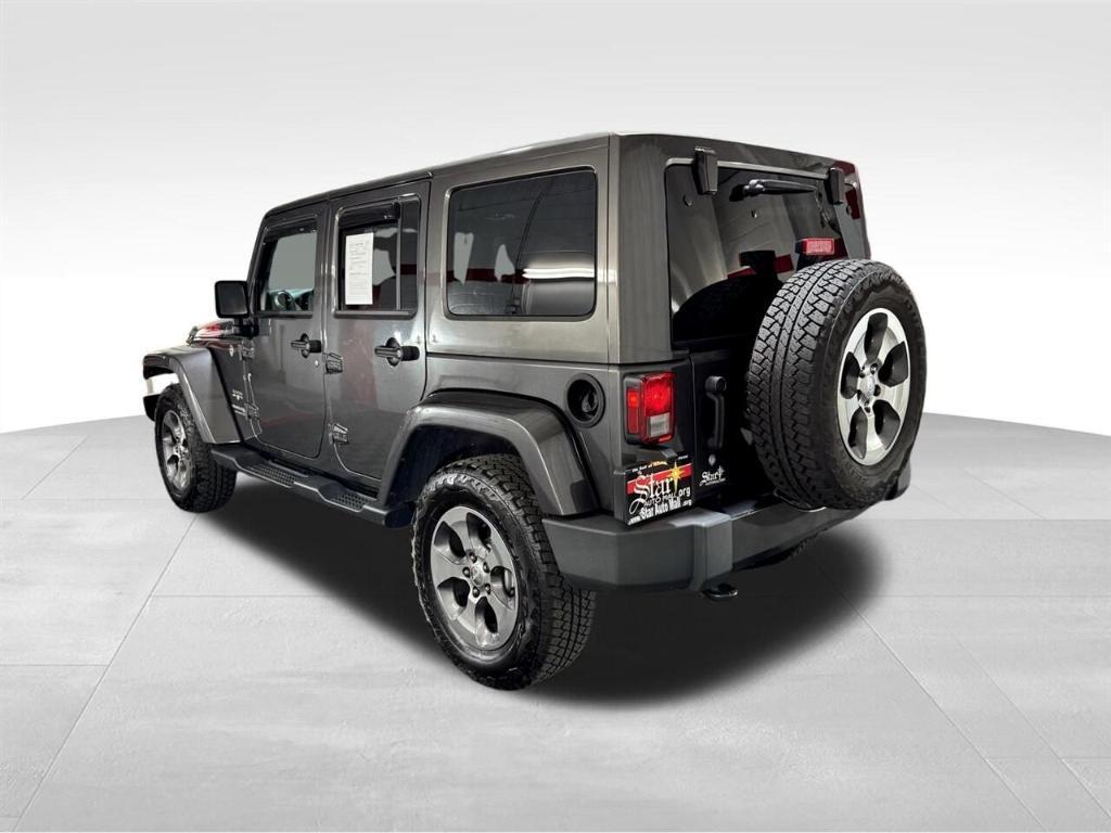 used 2018 Jeep Wrangler JK Unlimited car, priced at $23,977